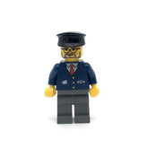 LEGO trn122 - (Dark Blue Suit with Train Logo, Dark Bluish Gray Legs, Black Hat, Gray Beard)